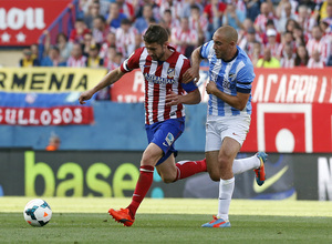 Temporada 2013-2014. Gabi intenta controlar un balón ante Amrabat