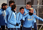 temporada 14/15. Entrenamiento en la ciudad deportiva de Majadahonda. Cristián Ridríguez y Griezmann bromeando durante el entrenamiento